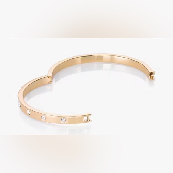 Kate Spade Stone Hinged Bangle in gold-tone plate with crystal embellishments. - Picture 2 of 5